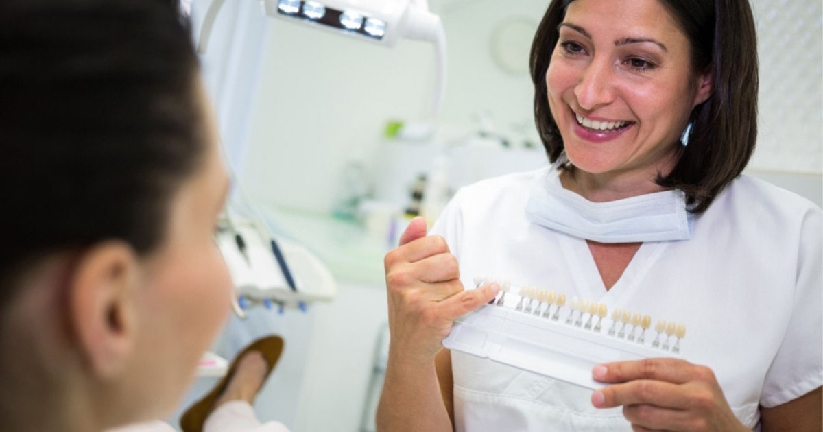 Dentist and patient reviewing veneer shade and shape planning in Belmont WA