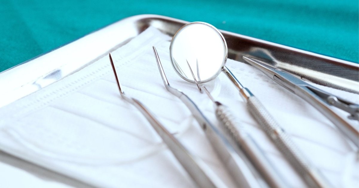 Dental mirror and instruments on a stainless steel tray in Belmont WA